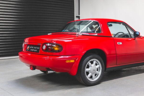 Offside rear exterior on Mazda MX5 MKI Classic Red Eunos Roadster
