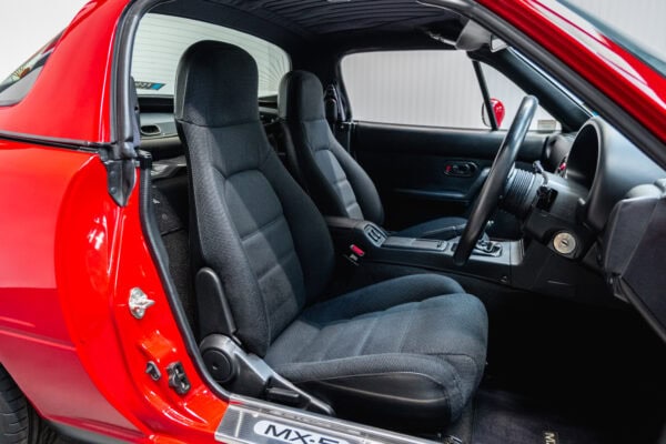 Offside view of cloth interior in Mazda MX5 MKI Classic Red Eunos Roadster