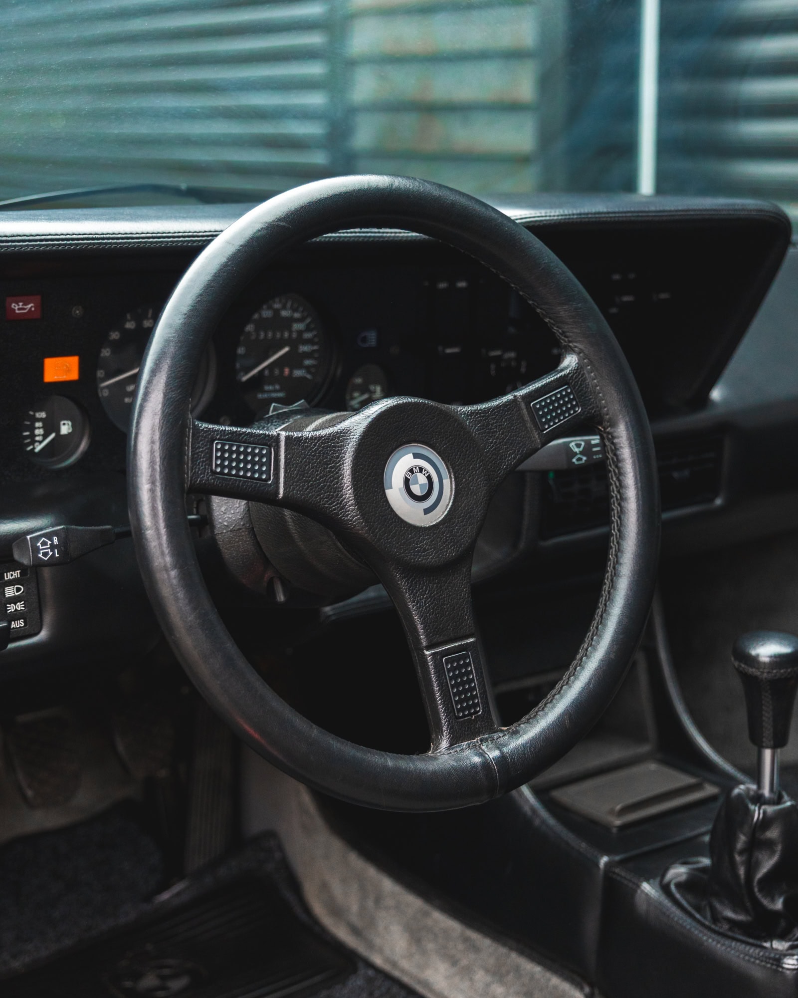 Steering wheel and centre console on 1980 E26 BMW M1 Nachtblau