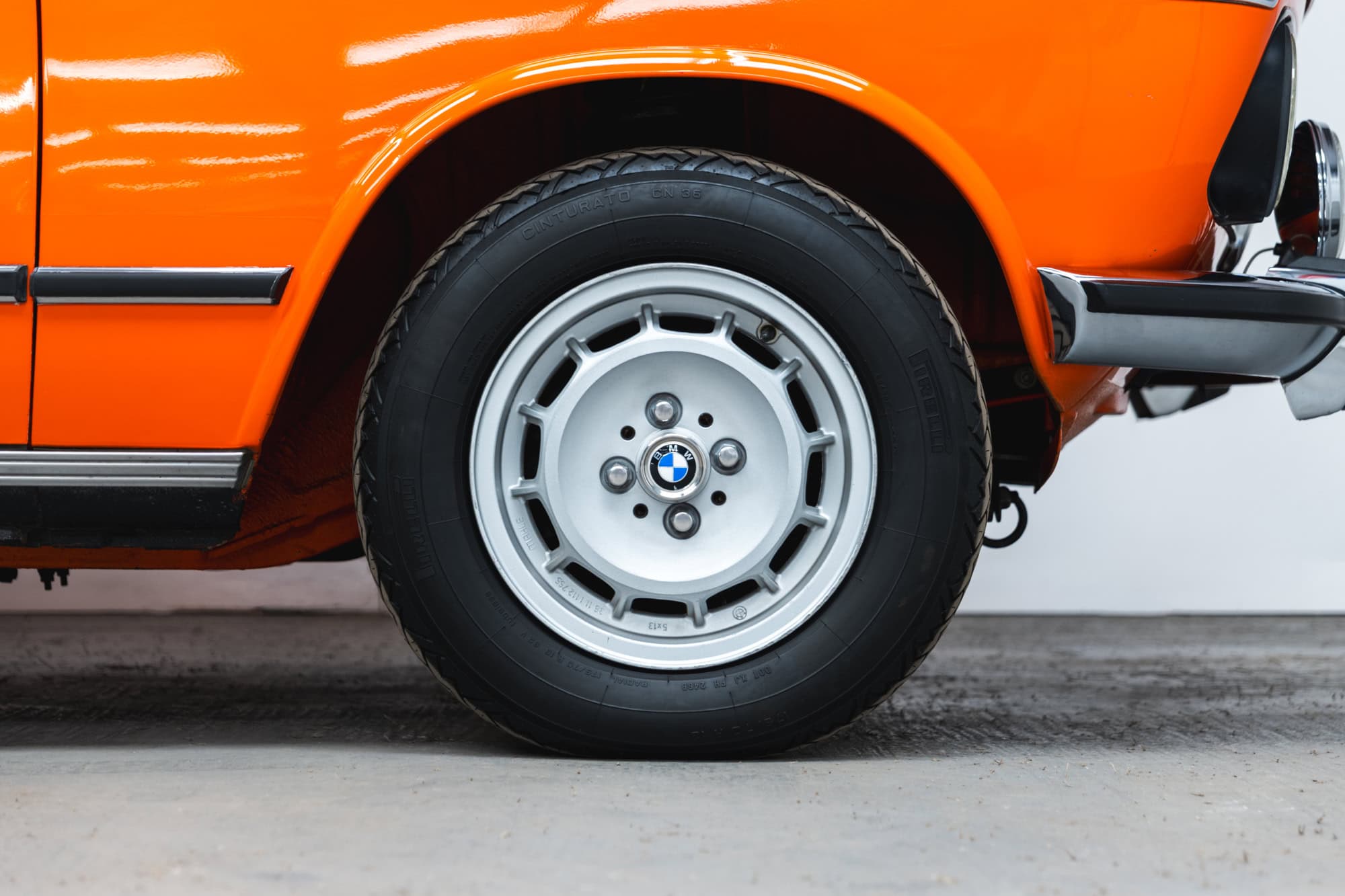 A Mahle alloy wheel of a 1975 BMW 2002 tii.