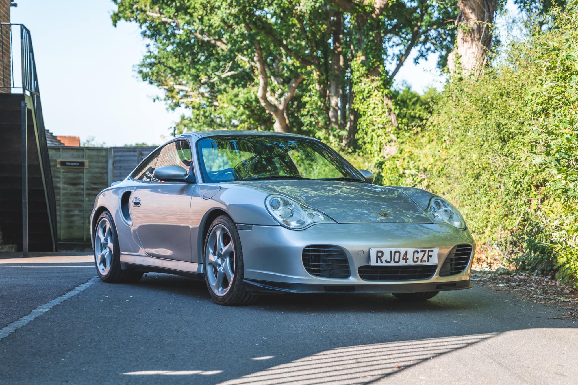 A silver Porsche 996 Turbo.