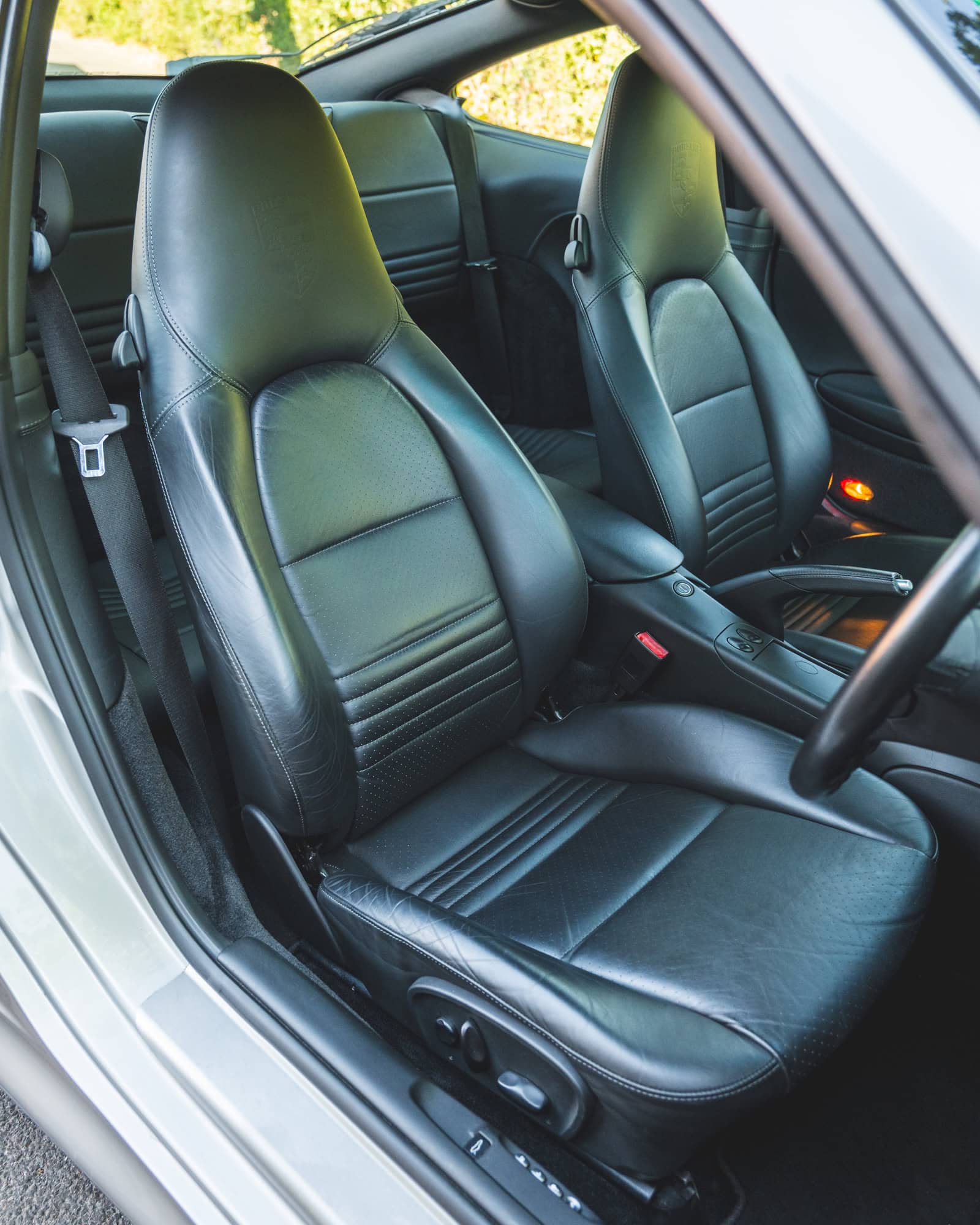 Black leather seats in a Porsche 996 Turbo.