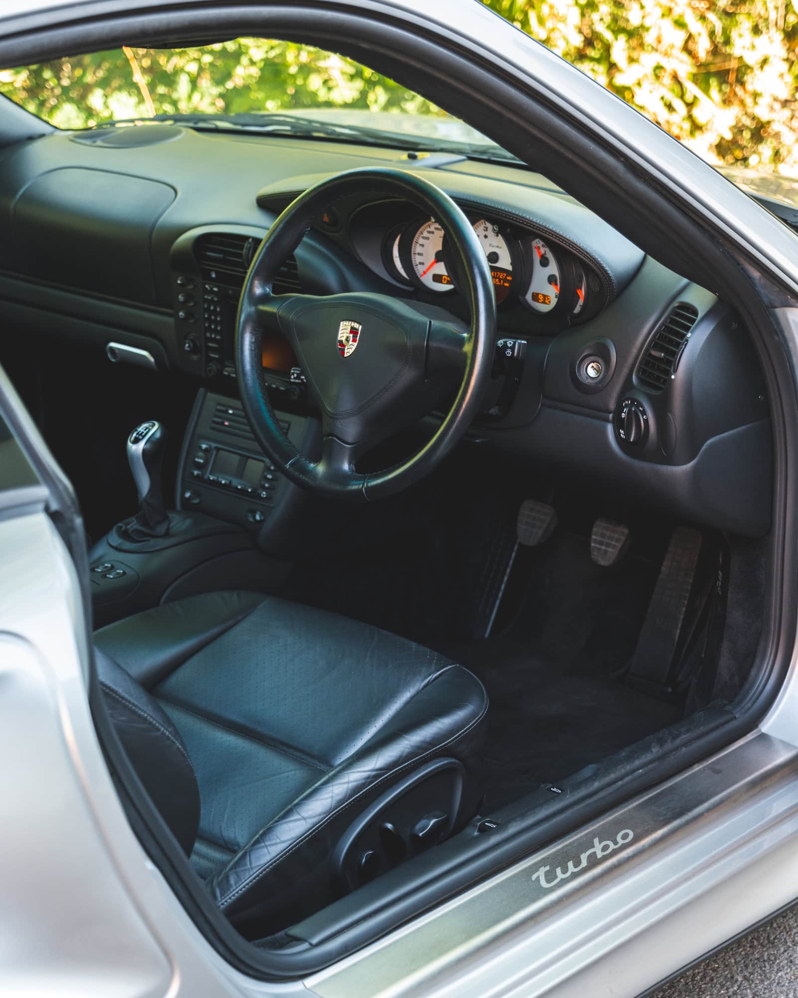 Black leather Porsche 996 interior.